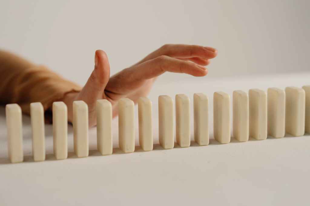 close up shot of a domino and hand